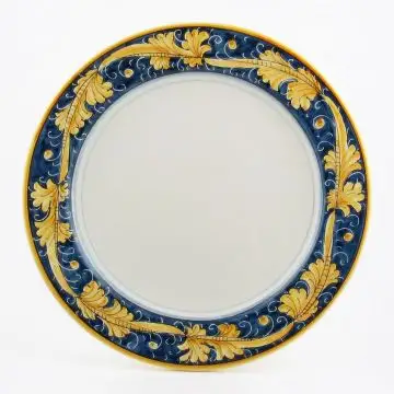 Italian charger plate from the Rinascimento Blu e Giallo collection handmade by Ceramiche Rampini in Gubbio, Italy