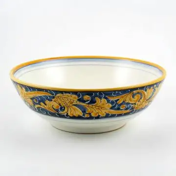 Italian serving bowl from the Rinascimento Blu e Giallo collection handmade by Ceramiche Rampini in Gubbio, Italy
