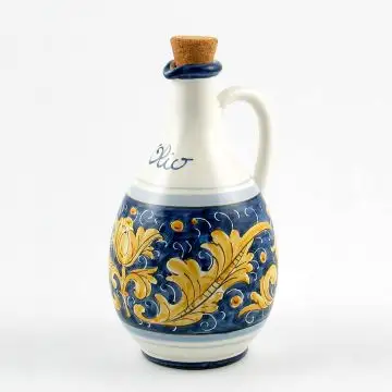 Italian oil bottle from the Rinascimento Blu e Giallo collection handmade by Ceramiche Rampini in Gubbio, Italy
