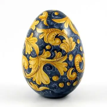 Italian ceramic egg with stand from the Rinascimento collection handmade by Ceramiche Rampini in Gubbio, Italy
