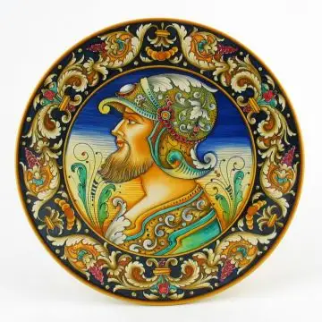 Italian wall plate featuring a Renaissance-style portrait of a warrior with helmet handmade by Alvaro Binaglia in Deruta Italy - main image