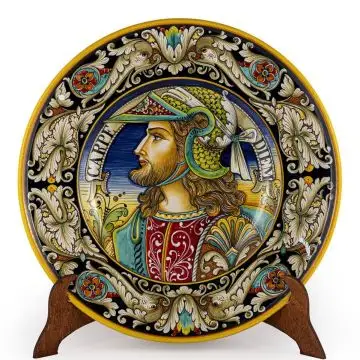 Italian wall plate featuring a Renaissance-style portrait of a warrior with long hair handmade by Alvaro Binaglia in Deruta Italy - main image