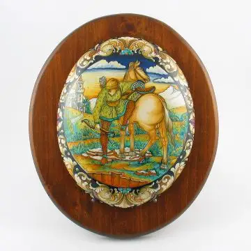 Italian oval plaque featuring a Renaissance-style portrait of a knight handmade by Alvaro Binaglia in Deruta Italy - main image