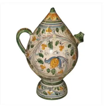 A green and golden "bummolo malandrino", a traditional jug from Sicily. It is handmade in Caltagirone, Italy. 