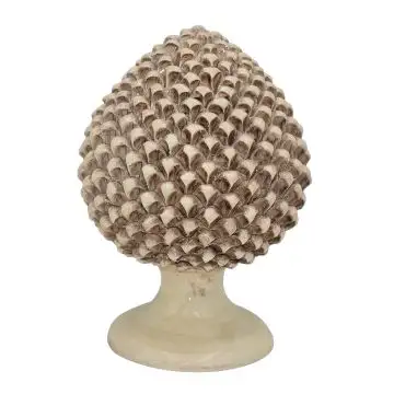 An antique mother-of-pearl pumo, a traditional ceramic pinecone carefully handmade in Caltagirone, Sicily.