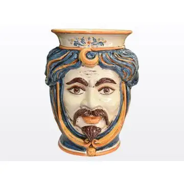 Sicilian Moorish head vase featuring a male character decorated in rich shades of blue and orange. It is handcrafted in Caltagirone, Italy.