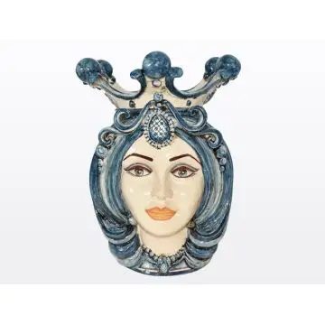 Sicilian Moorish head featuring a female character decorated in rich shades of blue and white. It is handcrafted in Caltagirone, Italy.