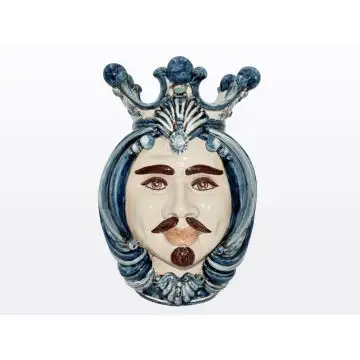 Sicilian Moorish head featuring a male character decorated in rich shades of blue and white. It is handcrafted in Caltagirone, Italy.