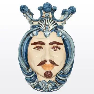 Sicilian Moorish head featuring a male character decorated in rich shades of blue and white. It is handcrafted in Caltagirone, Italy.