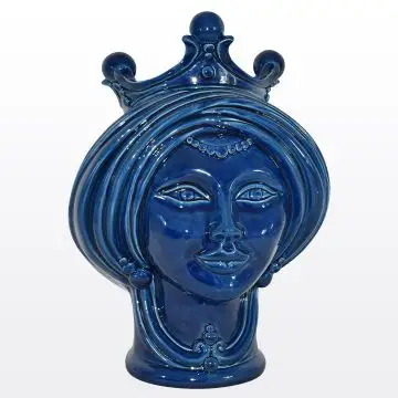 Blue Sicilian Moorish head with a crown featuring a female character. It is handcrafted in Caltagirone, Italy.