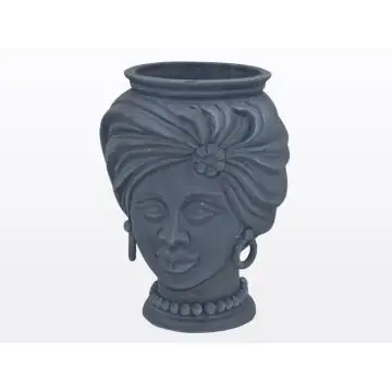 Matt blue Sicilian Moorish head featuring a female character. It is handcrafted in Caltagirone, Italy.