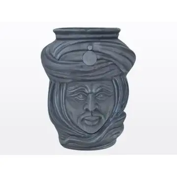 Matt blue Sicilian Moorish head featuring a male character. It is handcrafted in Caltagirone, Italy.