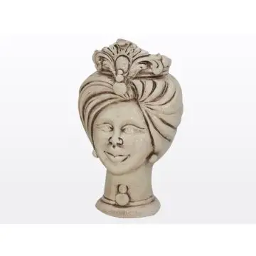 Sicilian Moorish head with a crown featuring a female character decorated in shades of antique ivory. It is handcrafted in Caltagirone, Italy.