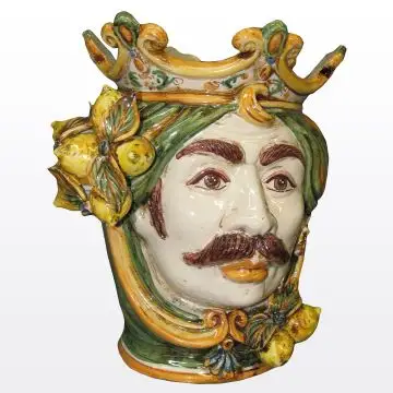 Sicilian Moorish head with lemons. It features a male character decorated in rich shades of green and orange. It is handcrafted in Caltagirone, Italy. Small