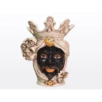 Sicilian head with pomegranates. It features a Moorish character decorated in rich shades of antique ivory. It is handcrafted in Caltagirone, Italy.