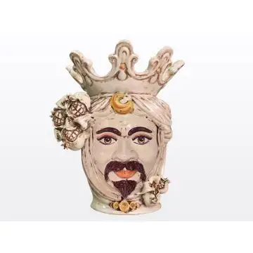 Sicilian Moorish head with pomegranates. It features a male character decorated in rich shades of antique ivory. It is handcrafted in Caltagirone, Italy.