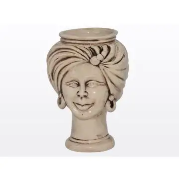 Sicilian Moorish head featuring a female character decorated in shades of antique ivory. It is handcrafted in Caltagirone, Italy.