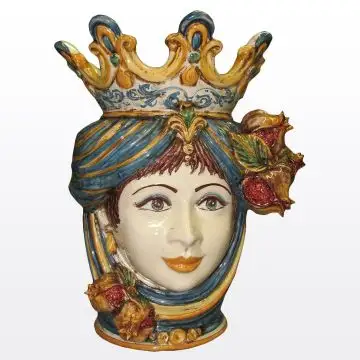 Sicilian Moorish head with pomegranates. It features a female character decorated in rich shades of blue and orange. It is handcrafted in Caltagirone, Italy. Large