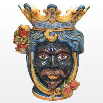 Sicilian head with pomegranates. It features a Moorish character decorated in rich shades of blue and orange. It is handcrafted in Caltagirone, Italy. Large