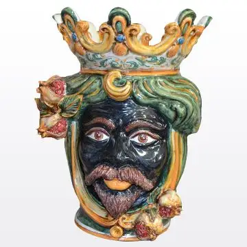 Sicilian head with pomegranates. It features a Moorish character decorated in rich shades of green and orange. It is handcrafted in Caltagirone, Italy. Large