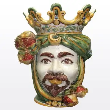 Sicilian Moorish head with pomegranates. It features a male character decorated in rich shades of green and orange. It is handcrafted in Caltagirone, Italy. Large