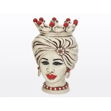 Sicilian Moorish head featuring a female character decorated in shades of antique ivory and red. It is handcrafted in Caltagirone, Italy.