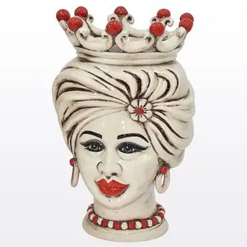 Sicilian Moorish head featuring a female character decorated in shades of antique ivory and red. It is handcrafted in Caltagirone, Italy.