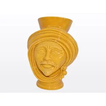 Yellow Sicilian Moorish head vase featuring a male character. It is handcrafted in Caltagirone, Italy.