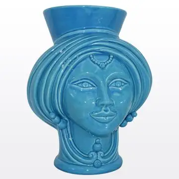 Azure Sicilian Moorish head featuring a female character. It is handcrafted in Caltagirone, Italy.