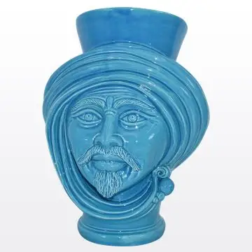 Azure Sicilian Moorish head featuring a male character. It is handcrafted in Caltagirone, Italy.