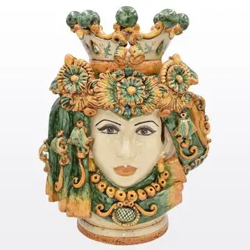 Regal Sicilian Moorish head featuring a female character decorated in rich shades of green and orange. It is handcrafted in Caltagirone, Italy.