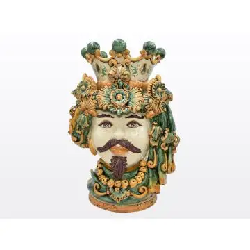 Regal Sicilian Moorish head featuring a male characterdecorated in rich shades of green and orange. It is handcrafted in Caltagirone, Italy.