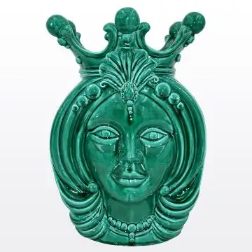 Green Sicilian Moorish head featuring a female character. It is handcrafted in Caltagirone, Italy.