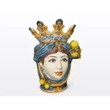 Sicilian Moorish head with lemons. It features a female character decorated in rich shades of blue and orange. It is handcrafted in Caltagirone, Italy. Large
