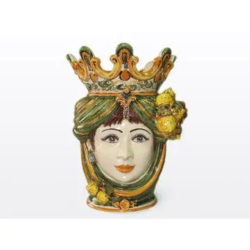 Sicilian Moorish head with lemons. It features a female character decorated in rich shades of green and orange. It is handcrafted in Caltagirone, Italy. Large