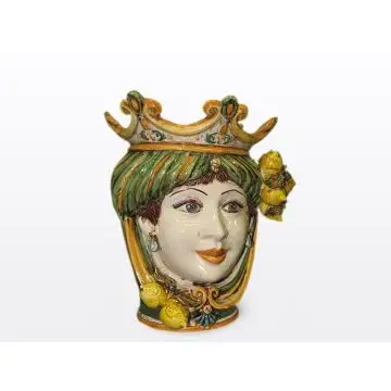 Sicilian Moorish head with lemons. It features a female character decorated in rich shades of green and orange. It is handcrafted in Caltagirone, Italy. Small