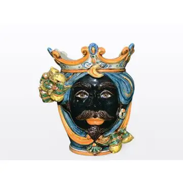 Sicilian head with lemons. It features a Moorish character decorated in rich shades of blue and orange. It is handcrafted in Caltagirone, Italy. Small
