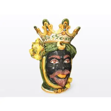 Sicilian head with lemons. It features a Moorish character decorated in rich shades of green and orange. It is handcrafted in Caltagirone, Italy. Large