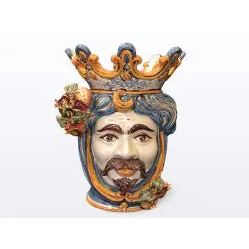 Sicilian Moorish head with pomegranates. It features a male character decorated in rich shades of blue and orange. It is handcrafted in Caltagirone, Italy. Large