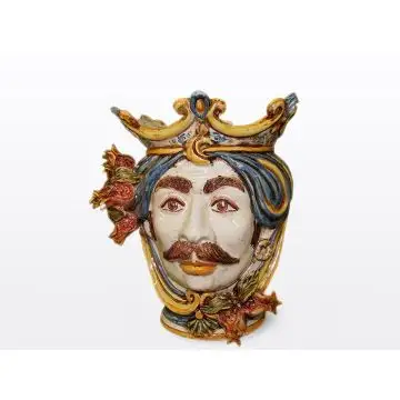 Sicilian Moorish head with pomegranates. It features a male character decorated in rich shades of blue and orange. It is handcrafted in Caltagirone, Italy. Small