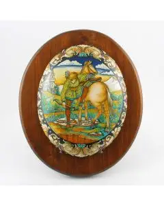 Italian oval plaque featuring a Renaissance-style portrait of a knight handmade by Alvaro Binaglia in Deruta Italy - main image