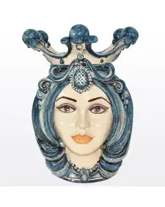 Sicilian Moorish head featuring a female character decorated in rich shades of blue and white. It is handcrafted in Caltagirone, Italy.