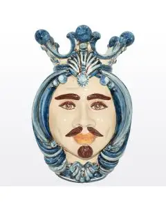 Sicilian Moorish head featuring a male character decorated in rich shades of blue and white. It is handcrafted in Caltagirone, Italy.