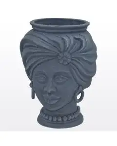 Matt blue Sicilian Moorish head featuring a female character. It is handcrafted in Caltagirone, Italy.
