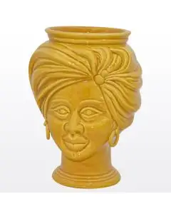 Yellow Sicilian Moorish head featuring a female character. It is handcrafted in Caltagirone, Italy.