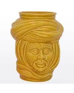 Yellow Sicilian Moorish head featuring a male character. It is handcrafted in Caltagirone, Italy.