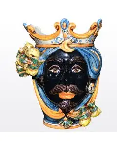 Sicilian head with lemons. It features a Moorish character decorated in rich shades of blue and orange. It is handcrafted in Caltagirone, Italy. Small