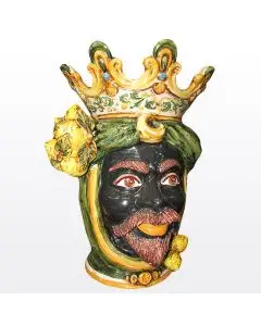 Sicilian head with lemons. It features a Moorish character decorated in rich shades of green and orange. It is handcrafted in Caltagirone, Italy. Large
