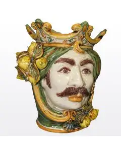 Sicilian Moorish head with lemons. It features a male character decorated in rich shades of green and orange. It is handcrafted in Caltagirone, Italy. Small