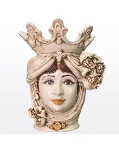 Sicilian Moorish head with pomegranates. It features a female character decorated in rich shades of antique ivory. It is handcrafted in Caltagirone, Italy.